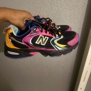 New Balance Black, Pink, and Yellow Athletic Shoes